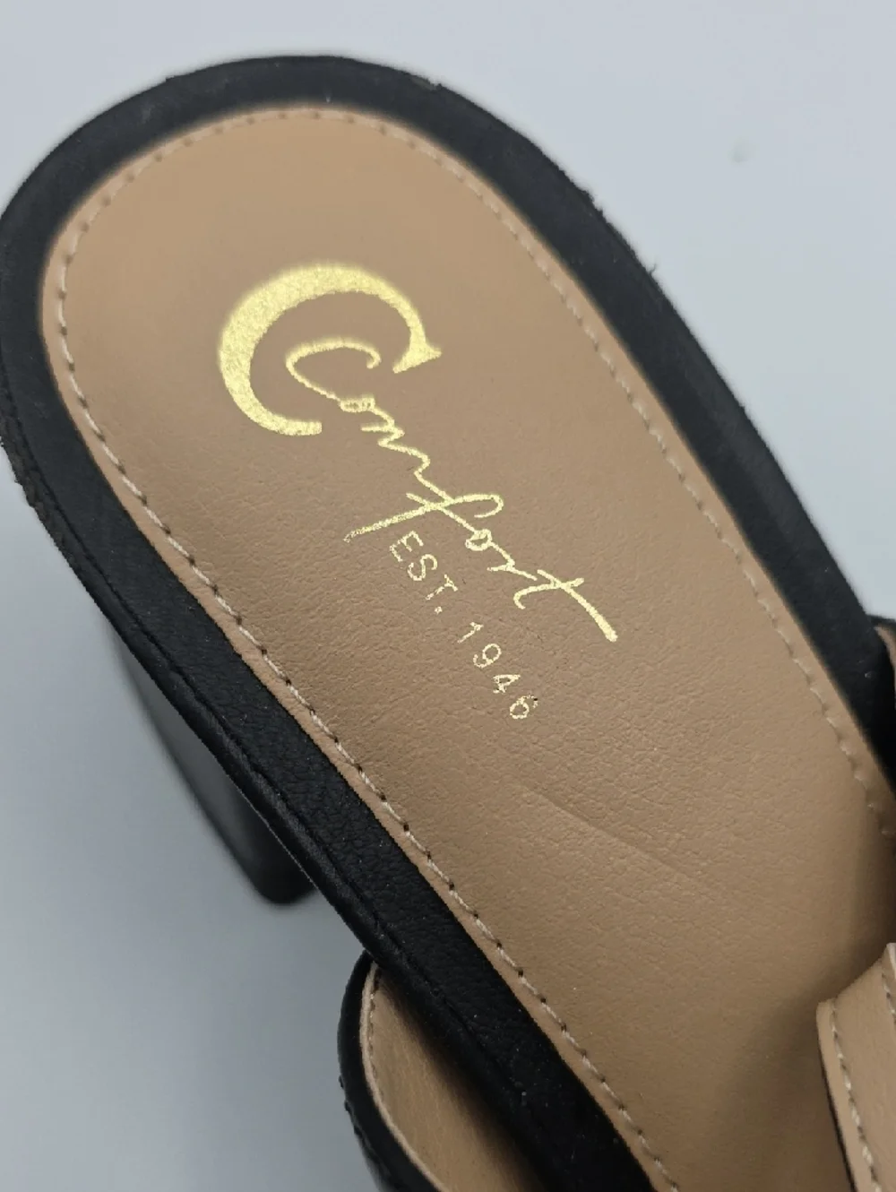 C Est. 1946 sophisticated black